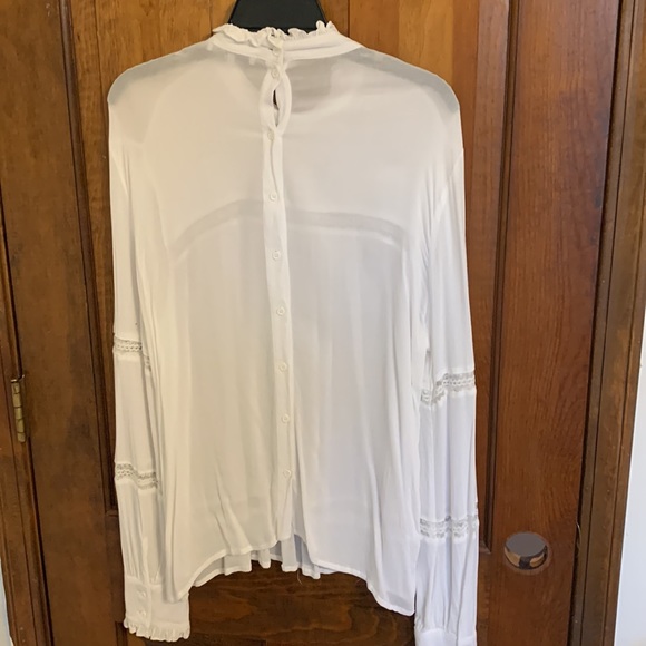 Long sleeve white blouse with lace accents - Picture 2 of 4
